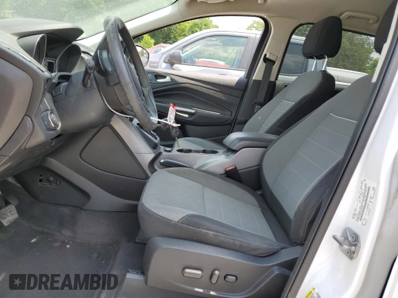 2014 Ford Escape SE z VIN 1FMCU0G91EUD32658, wystawiony jako Copart lot #58417565 z przebiegiem 186 255 mil mil oraz Szkoda całkowita • Salvage title. Historia ofert i sprzedaży dostępna na DreamBid. Obrazek 7.