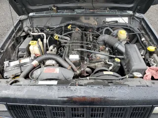 1999 Jeep Cherokee Sport with VIN 1J4FF68S8XL671341, listed as a Copart auction lot 58136475 with 139,848 mi miles and Salvage title. Bid and sale history available at DreamBid. Image 12.