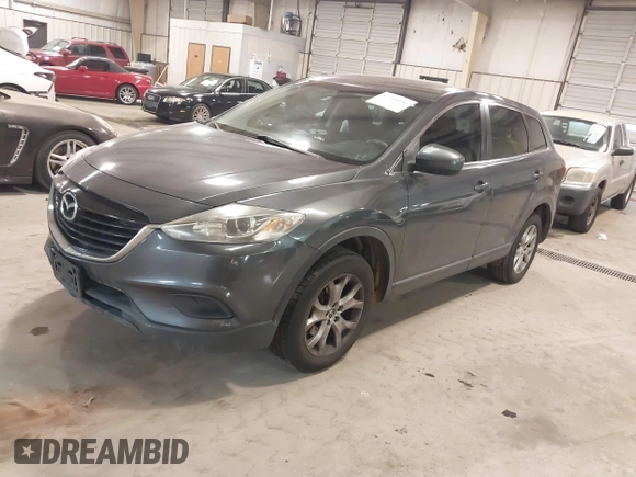 2014 Mazda CX-9 Sport with VIN JM3TB3BV3E0434817, listed as a IAAI auction lot 41394036 with 157,304 mi miles. Bid and sale history available at carsss.com. Image 19.