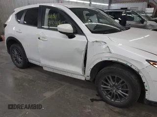 2017 Mazda CX-5 Touring with VIN JM3KFBCL9H0107589, listed as a IAAI auction lot 41241481 with 77,032 mi miles. Bid and sale history available at carsss.com. Image 18.