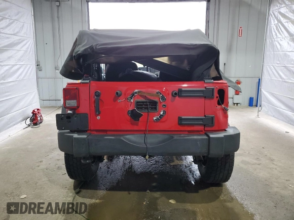 2014 Jeep Wrangler Sport with VIN 1C4AJWAG6EL139619, listed as a Copart auction lot 54935445 with 79,001 mi miles and Salvage title. Bid and sale history available at DreamBid. Image 6.
