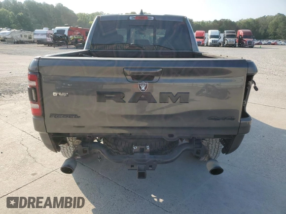 2020 Ram 1500 Rebel with VIN 1C6SRFLT4LN144723, listed as a Copart auction lot 59843935 with 90,936 mi miles and Salvage title. Bid and sale history available at DreamBid. Image 6.