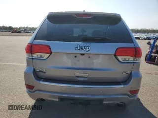 2018 Jeep Grand Cherokee Overland z VIN 1C4RJFCM3JC401399, wystawiony jako Copart lot #53167035 z przebiegiem 87 886 mil mil oraz Nie do naprawy • Non repairable. Historia ofert i sprzedaży dostępna na DreamBid. Obrazek 6.