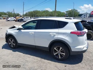 2017 Toyota RAV4 XLE with VIN 2T3RFREV1HW683851, listed as a IAAI auction lot 42051722 with 98,307 mi miles. Bid and sale history available at carsss.com. Image 14.