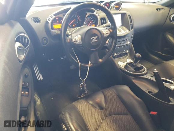 2013 Nissan 370Z Touring with VIN JN1AZ4FH7DM790607, listed as a Copart auction lot 57915234 with 11,487 mi miles and Salvage Title. Bid and sale history available at carsss.com. Image 8.