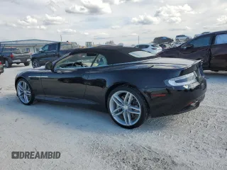 2015 Aston Martin DB9 z VIN SCFFDAFM3FGB16585, wystawiony jako Copart lot #76159354 z przebiegiem Nie podano mil oraz Szkody całkowita. Historia ofert i sprzedaży dostępna na DreamBid. Obrazek 2.