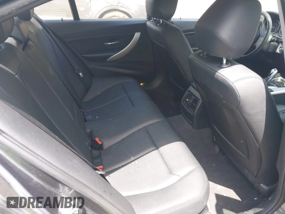 2014 BMW 3 Series 320i xDrive with VIN WBA3C3C57EP662795, listed as a IAAI auction lot 42267683 with 153,451 mi miles and . Bid and sale history available at DreamBid. Image 8.