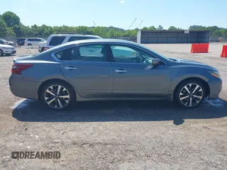 2017 Nissan Altima SV with VIN 1N4AL3AP5HC493702, listed as a IAAI auction lot 42661383 with 195,280 mi miles and . Bid and sale history available at DreamBid. Image 13.