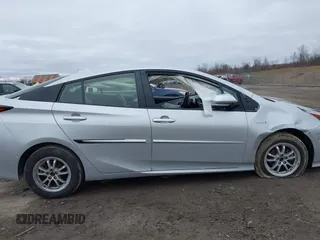 2021 Toyota Prius LE z VIN JTDL9MFU4M3028389, wystawiony jako IAAI lot #41800573 z przebiegiem 32 623 mil mil oraz . Historia ofert i sprzedaży dostępna na DreamBid. Obrazek 13.