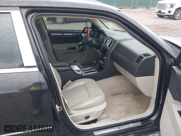 2005 Chrysler 300 with VIN 2C3JA63H05H608145, listed as a IAAI auction lot 42075474 with 167,098 mi miles. Bid and sale history available at carsss.com. Image 5.