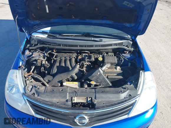 2012 Nissan Versa S with VIN 3N1BC1CP7CK810790, listed as a IAAI auction lot 41906514 with 184,517 mi miles. Bid and sale history available at carsss.com. Image 10.