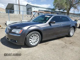 2014 Chrysler 300 z VIN 2C3CCAAG4EH211571, wystawiony jako Copart lot #55604785 z przebiegiem 65 410 mil mil oraz Szkody całkowita. Historia ofert i sprzedaży dostępna na DreamBid. Obrazek 1.