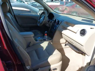 2005 Ford Freestyle Limited with VIN 1FMZK03115GA76441, listed as a IAAI auction lot 41697920 with 216,365 mi miles. Bid and sale history available at carsss.com. Image 5.