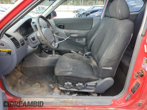 2005 Hyundai Accent GLS с VIN KMHCG35C45U359201, выставлен на аукционе Copart как лот 49072705 с пробегом 93 299 миль миль и На запчасти • Non repairable. История ставок и продаж доступна на DreamBid. Изображение 7.
