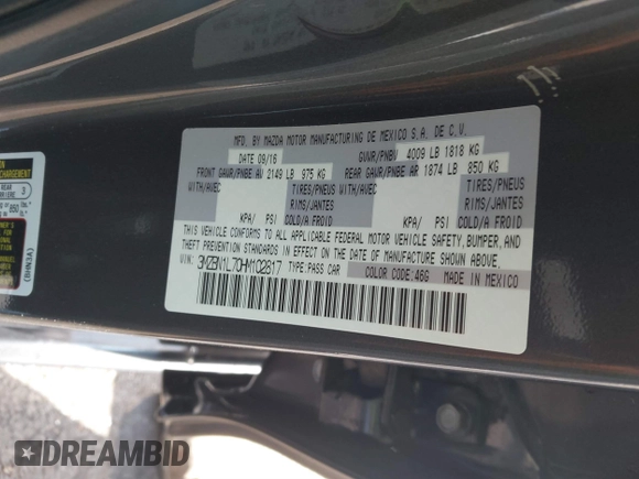 2017 Mazda 3 Touring with VIN 3MZBN1L70HM102817, listed as a IAAI auction lot 41867063 with 100,307 mi miles and . Bid and sale history available at DreamBid. Image 9.