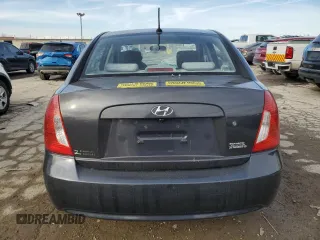 2010 Hyundai Accent GLS with VIN KMHCN4AC5AU469945, listed as a Copart auction lot 46532395 with 140,694 mi miles and Salvage Title. Bid and sale history available at carsss.com. Image 6.