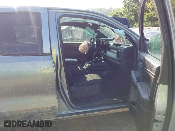 2024 Chevrolet Colorado 4WD Trail Boss with VIN 1GCPTEEK8R1307923, listed as a IAAI auction lot 42423905 with 4,190 mi miles and . Bid and sale history available at DreamBid. Image 5.