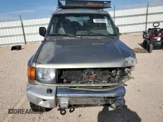 1998 Mitsubishi Montero z VIN JA4MR51R0WJ000921, wystawiony jako Copart lot #56250965 z przebiegiem 181 293 mil mil oraz Szkoda całkowita • Salvage title. Historia ofert i sprzedaży dostępna na DreamBid. Obrazek 5.
