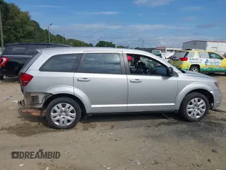 2014 Dodge Journey SE with VIN 3C4PDCAB7ET268221, listed as a IAAI auction lot 40262445 with 153,490 mi miles and . Bid and sale history available at carsss.com. Image 13.