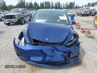 2024 Tesla Model Y Long Range z VIN 7SAYGDEEXRF128967, wystawiony jako IAAI lot #42216304 z przebiegiem 17 193 mil mil oraz . Historia ofert i sprzedaży dostępna na DreamBid. Obrazek 13.