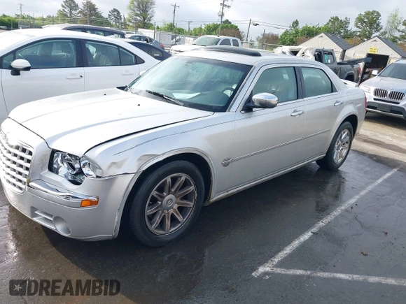 2006 Chrysler 300 C with VIN 2C3KA63H16H352507, listed as a IAAI auction lot 41926057 with 129,962 mi miles. Bid and sale history available at carsss.com. Image 2.