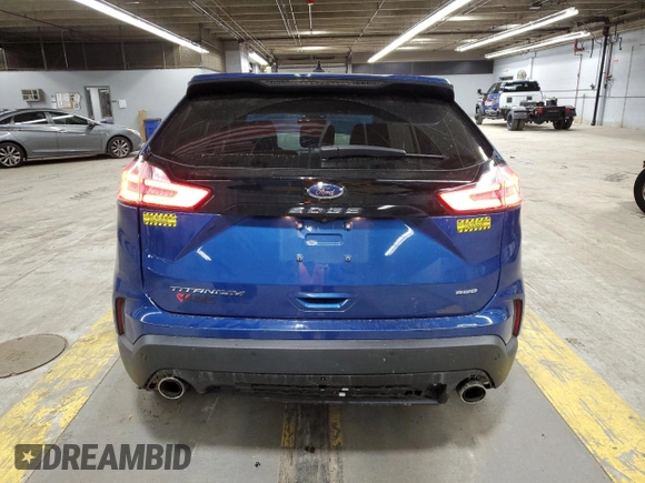 2021 Ford Edge Titanium with VIN 2FMPK4K98MBA18841, listed as a Copart auction lot 56207745 with 69,249 mi miles and Salvage title. Bid and sale history available at DreamBid. Image 6.