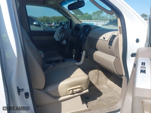 2012 Nissan Pathfinder SV with VIN 5N1AR1NN1CC616194, listed as a IAAI auction lot 40821219 with 104,698 mi miles. Bid and sale history available at carsss.com. Image 5.