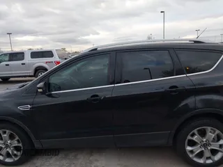 2015 Ford Escape Titanium with VIN 1FMCU9J96FUA27221, listed as a IAAI auction lot 41925276 with 180,758 mi miles and . Bid and sale history available at carsss.com. Image 14.