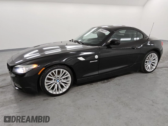 2012 BMW Z4 sDrive35i with VIN WBALM7C52CE385017, listed as a Copart auction lot 43223005 with 87,408 mi miles and Clean Title. Bid and sale history available at carsss.com. Image 1.