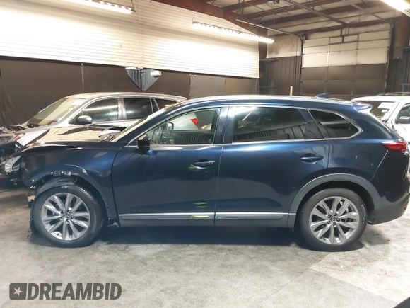 2020 Mazda CX-9 Grand Touring with VIN JM3TCBDY4L0403376, listed as a IAAI auction lot 42357363 with 86,716 mi miles and . Bid and sale history available at DreamBid. Image 14.