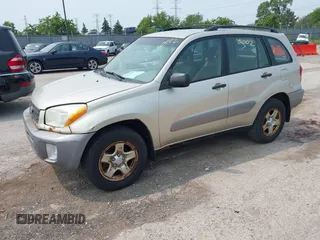 2003 Toyota RAV4 z VIN JTEGH20V830102676, wystawiony jako IAAI lot #42470002 z przebiegiem 210 984 mil mil oraz . Historia ofert i sprzedaży dostępna na DreamBid. Obrazek 2.