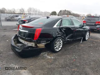 2015 Cadillac XTS Luxury with VIN 2G61M5S38F9138545, listed as a IAAI auction lot 41690696 with 136,460 mi miles and . Bid and sale history available at DreamBid. Image 4.