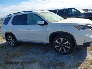 2024 Honda Pilot Elite with VIN 5FNYG1H81RB025163, listed as a IAAI auction lot 40502507 with 9,867 mi miles. Bid and sale history available at carsss.com. Image 13.