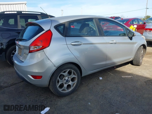 2011 Ford Fiesta SES with VIN 3FADP4FJ1BM149138, listed as a IAAI auction lot 41612288 with 131,798 mi miles. Bid and sale history available at carsss.com. Image 4.
