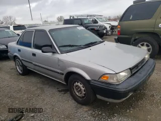 1992 Toyota Corolla z VIN 1NXAE91A1NZ346555, wystawiony jako Copart lot #37697334 z przebiegiem 232 988 mil mil oraz Szkoda całkowita • Salvage title. Historia ofert i sprzedaży dostępna na DreamBid. Obrazek 4.