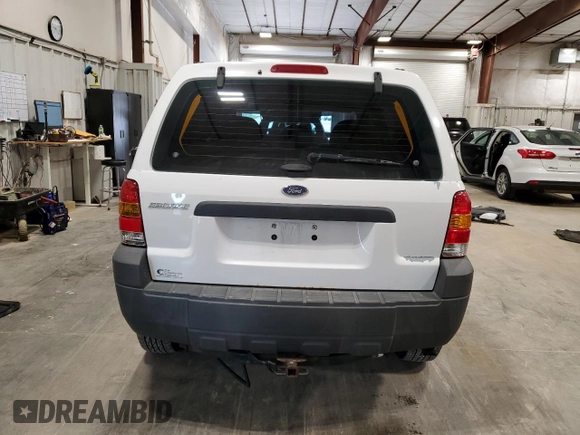 2007 Ford Escape XLS with VIN 1FMYU02Z47KA04520, listed as a Copart auction lot 62607805 with 109,276 mi miles and Clean title. Bid and sale history available at DreamBid. Image 6.