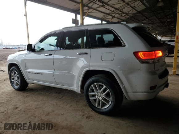 2017 Jeep Grand Cherokee Overland with VIN 1C4RJFCG2HC834328, listed as a Copart auction lot 45199855 with 87,061 mi miles and Salvage Title. Bid and sale history available at carsss.com. Image 2.