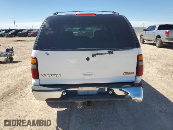 2001 GMC Yukon SLT z VIN 1GKEC13T81J152049, wystawiony jako Copart lot #56494675 z przebiegiem 160 102 mil mil oraz Szkoda całkowita • Salvage title. Historia ofert i sprzedaży dostępna na DreamBid. Obrazek 6.