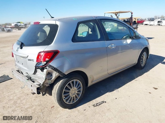 2015 Toyota Yaris L with VIN VNKJTUD38FA020465, listed as a IAAI auction lot 41416577 with 142,751 mi miles. Bid and sale history available at carsss.com. Image 4.