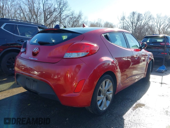 2016 Hyundai Veloster z VIN KMHTC6AD1GU260219, wystawiony jako IAAI lot #41114806 z przebiegiem 128 000 mil mil oraz . Historia ofert i sprzedaży dostępna na DreamBid. Obrazek 4.