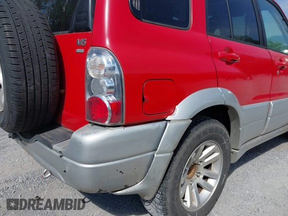 2005 Suzuki Grand Vitara LX with VIN JS3TD62VX54201211, listed as a IAAI auction lot 42220221 with 242,165 mi miles and . Bid and sale history available at DreamBid. Image 16.