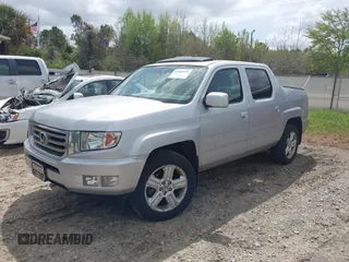 2014 Honda Ridgeline RTL with VIN 5FPYK1F53EB013752, listed as a IAAI auction lot 41886851 with 89,038 mi miles and . Bid and sale history available at DreamBid. Image 2.