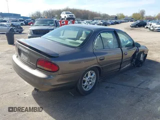 2000 Oldsmobile Intrigue GX z VIN 1G3WH52H0YF280823, wystawiony jako IAAI lot #42199925 z przebiegiem 102 427 mil mil oraz . Historia ofert i sprzedaży dostępna na DreamBid. Obrazek 4.