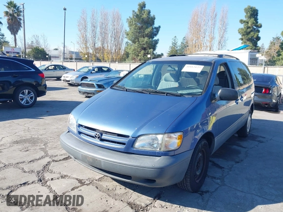 1999 Toyota Sienna LE with VIN 4T3ZF13C2XU126738, listed as a IAAI auction lot 41012127 with 218,080 mi miles. Bid and sale history available at carsss.com. Image 2.