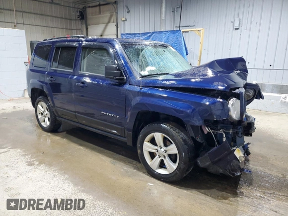 2014 Jeep Patriot Latitude with VIN 1C4NJRFB0ED852882, listed as a Copart auction lot 49674915 with 130,367 mi miles and Salvage title. Bid and sale history available at DreamBid. Image 4.