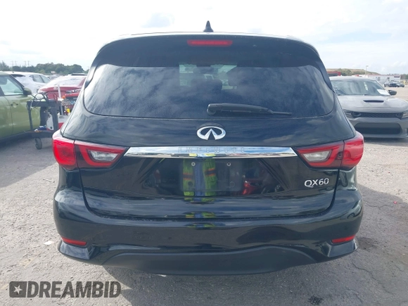 2019 Infiniti QX60 LUXE with VIN 5N1DL0MN0KC549578, listed as a IAAI auction lot 41362311 with 162,457 mi miles. Bid and sale history available at carsss.com. Image 16.