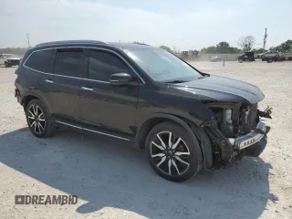 2020 Honda Pilot Touring 8-Passenger with VIN 5FNYF5H98LB013778, listed as a Copart auction lot 53112115 with 86,276 mi miles and Salvage Title. Bid and sale history available at DreamBid. Image 4.