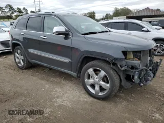 2011 Jeep Grand Cherokee Overland with VIN 1J4RS6GG1BC636963, listed as a Copart auction lot 87654425 with 189,736 mi miles and Salvage Title. Bid and sale history available at DreamBid. Image 4.