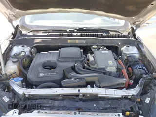2014 Ford Fusion Titanium Hybrid with VIN 3FA6P0RU9ER147443, listed as a IAAI auction lot 41739540 with 146,359 mi miles. Bid and sale history available at carsss.com. Image 10.