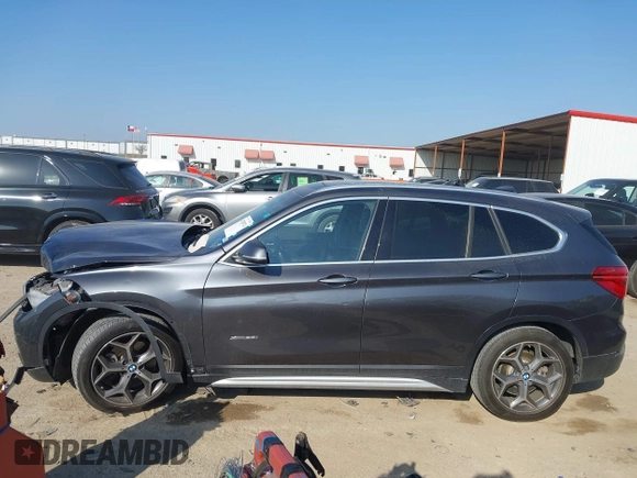 2016 BMW X1 xDrive28i with VIN WBXHT3Z35G4A49941, listed as a IAAI auction lot 41789774 with 111,661 mi miles and . Bid and sale history available at DreamBid. Image 14.
